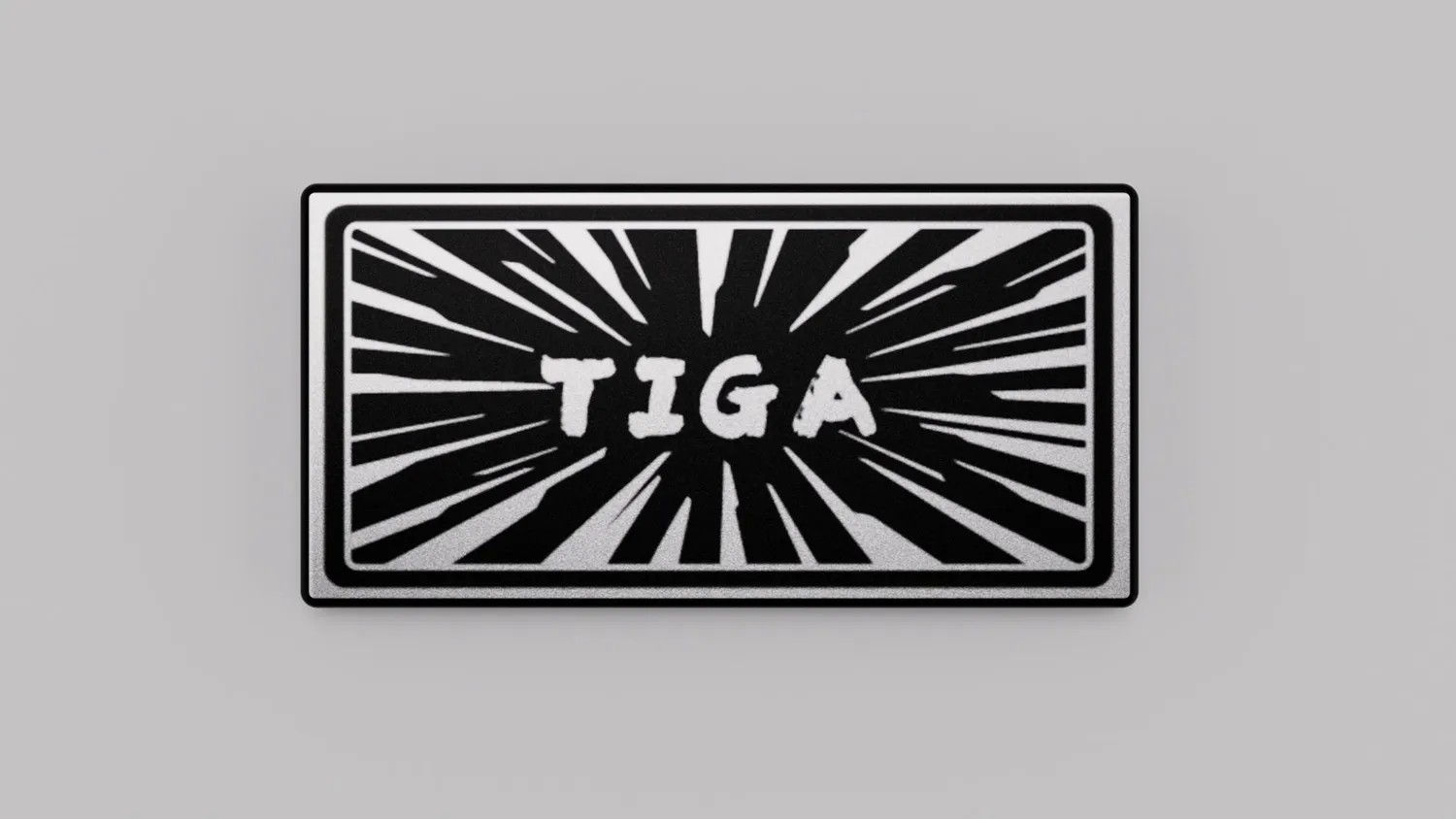 Zoom75 Tiga badge decorativo Prologue